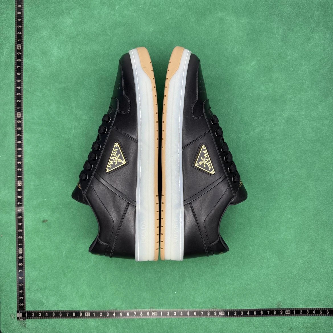 Prada Black Leather Sneakers with Gold Logo