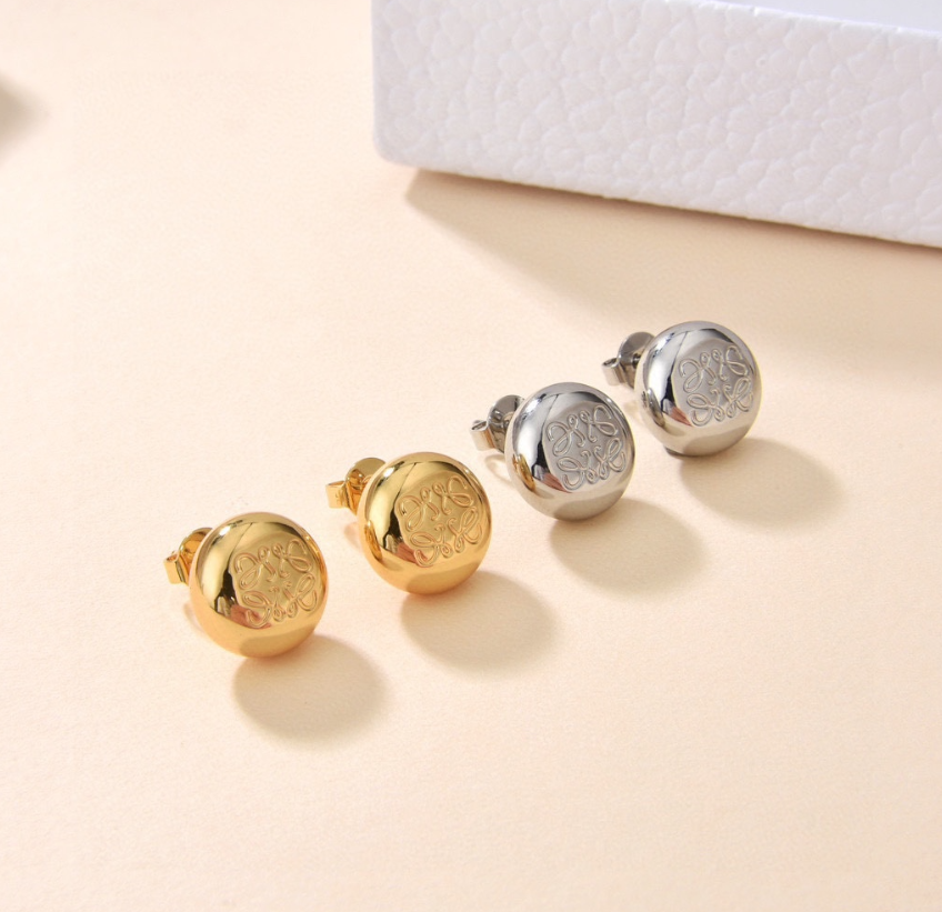 Elegant Gold and Silver Stud Earrings with Engraved Design