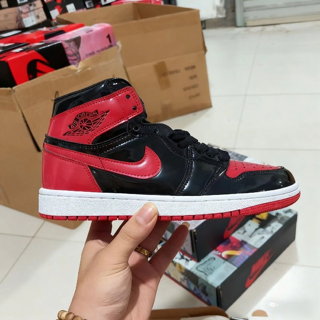Air Jordan 1 High OG Black Red Patent Leather Sneakers