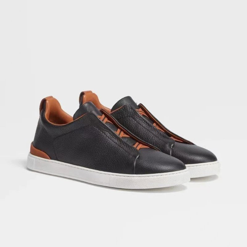 Men's Black Leather Slip-On Sneakers with Orange Accents