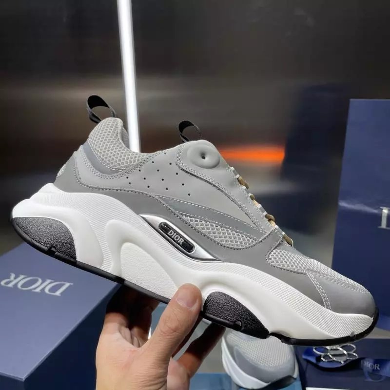 Dior Men's Gray and White Sneakers with Bold Sole Design