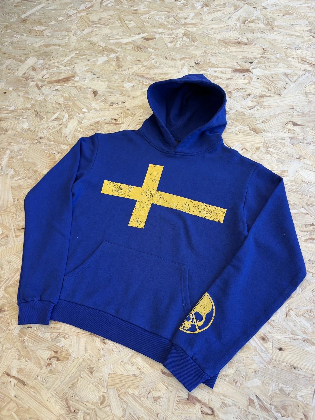 Blue Hoodie with Yellow Cross Design