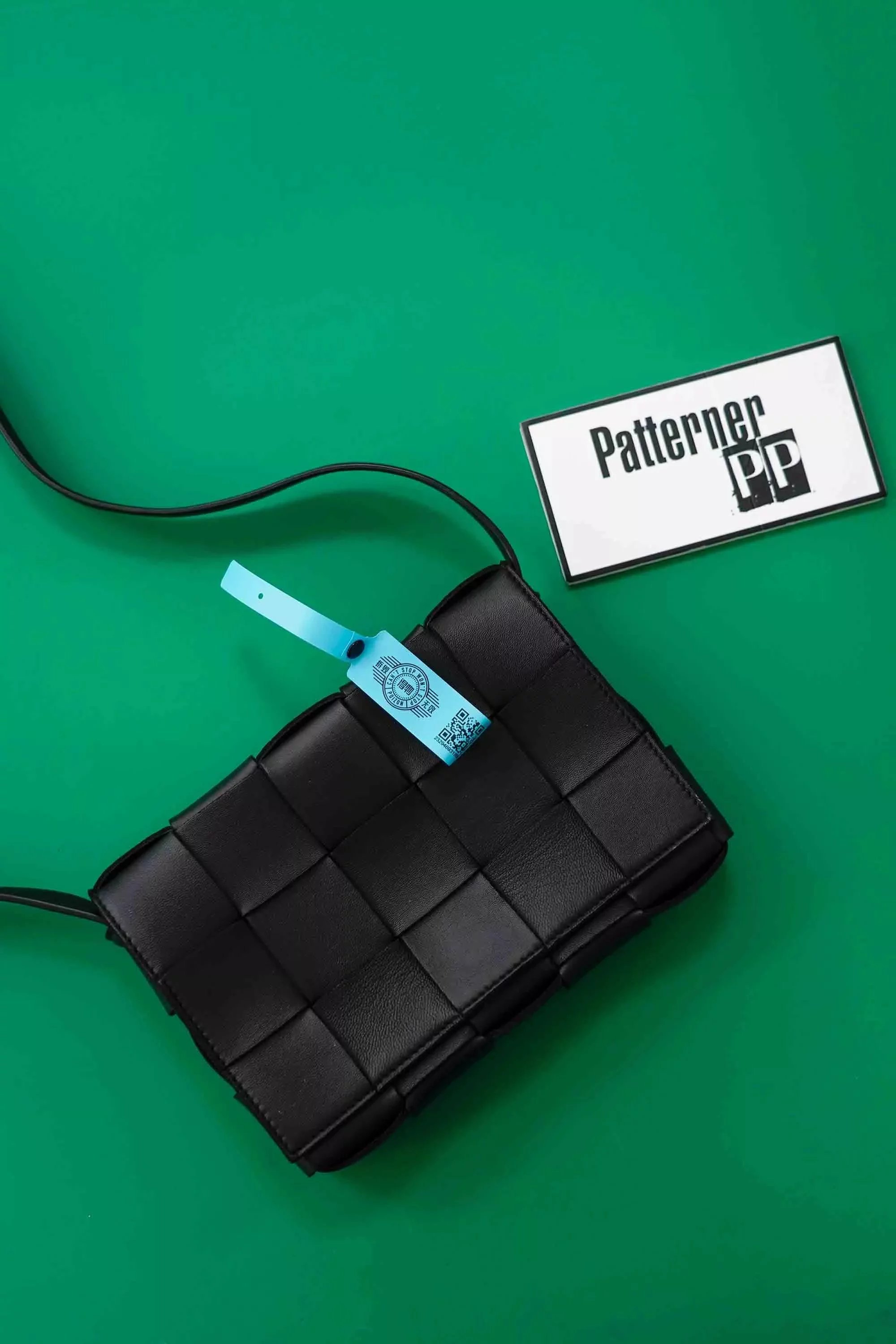 Patterner PP Black Woven Leather Crossbody Bag