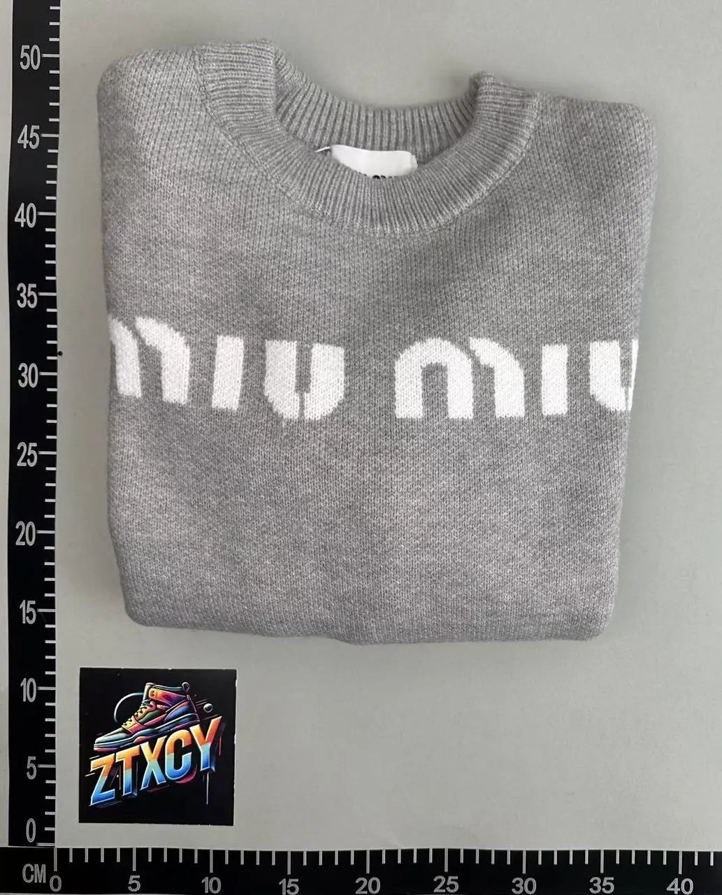 Miu Miu Gray Knit Sweater with Logo Print