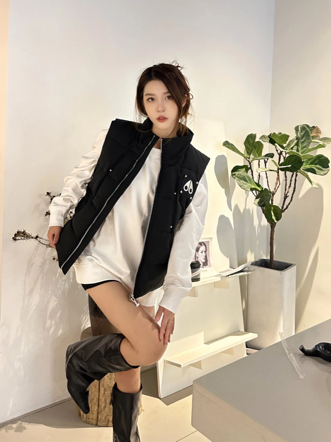 Stylish Black Sleeveless Puffer Vest with Zipper and Logo