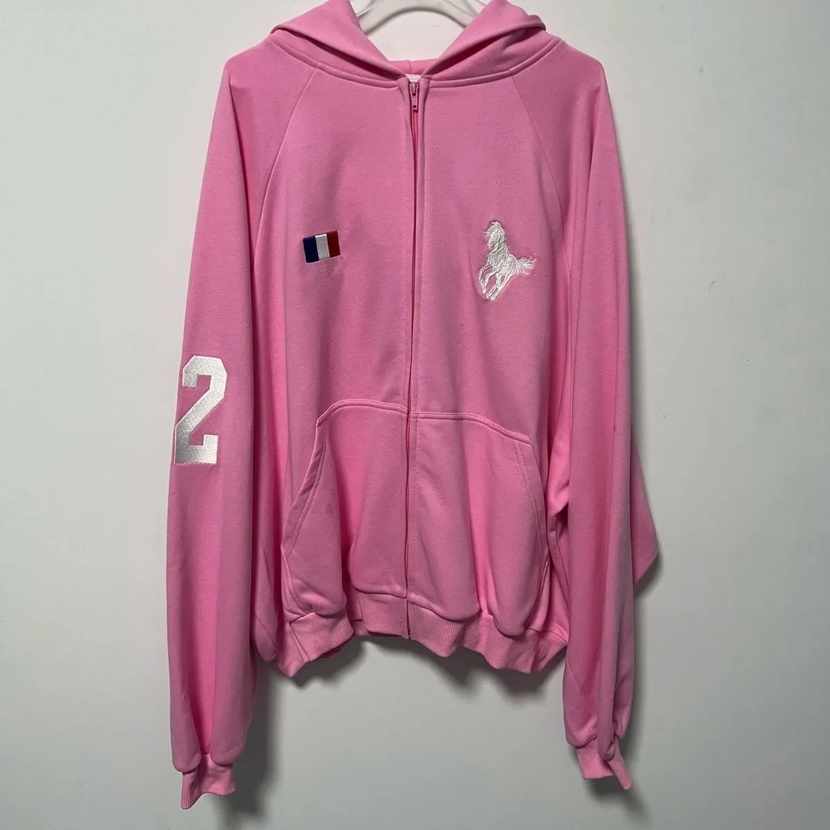 Pink Zip-Up Hoodie with Horse Logo and Number 2