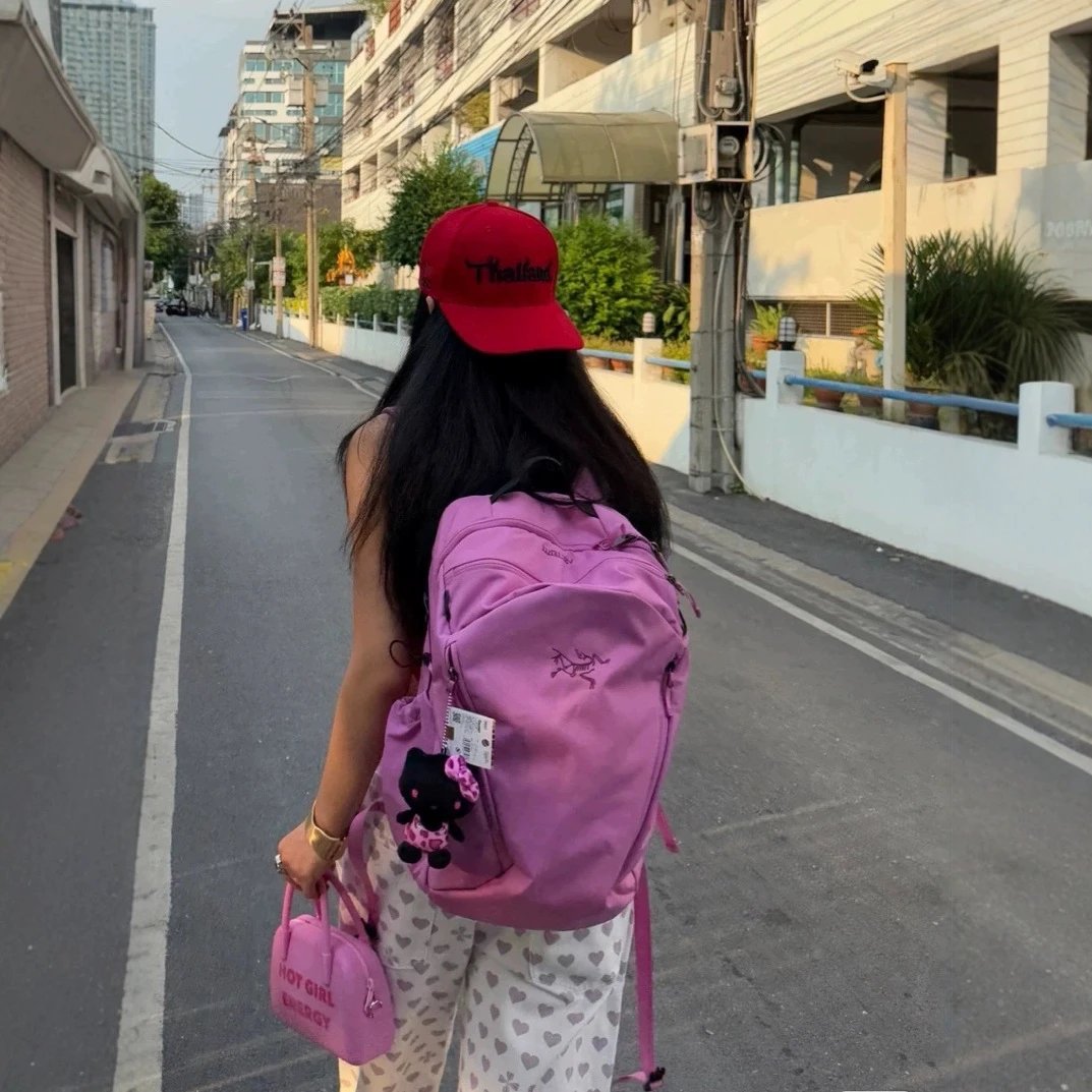 Pink Kipling Backpack with Cute Charm for Women