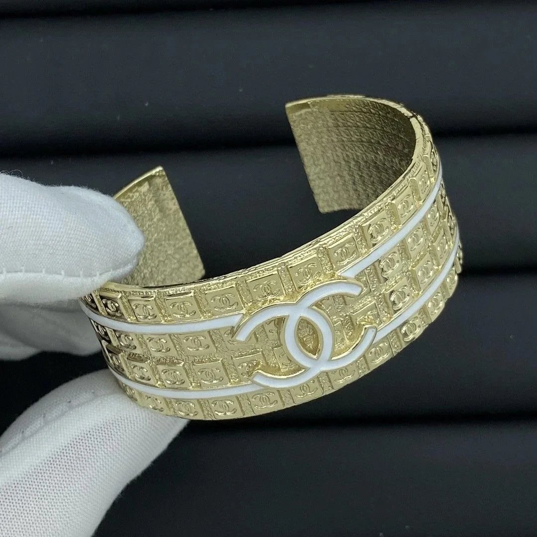 Chanel Gold Tone Cuff Bracelet with CC Logo