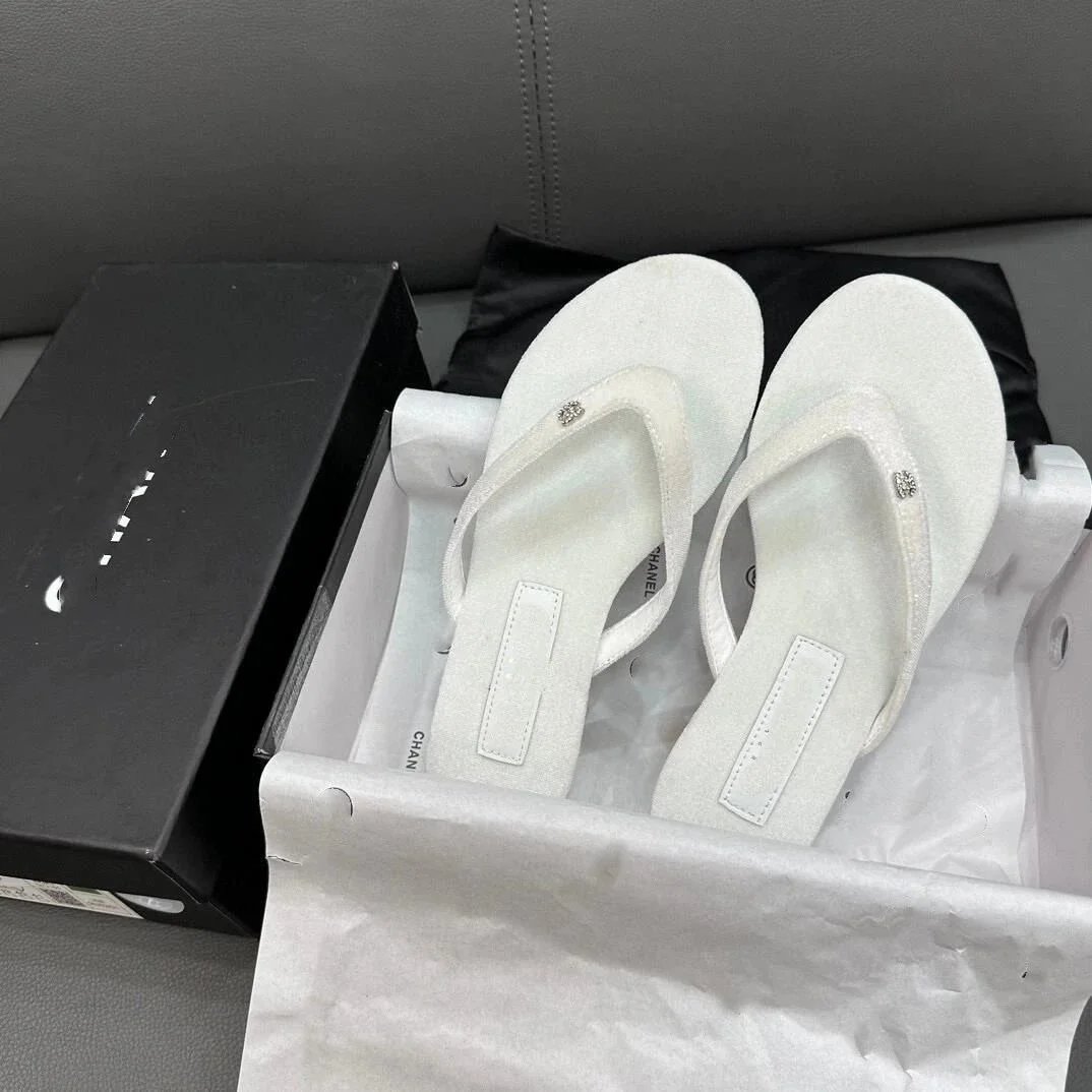 White Chanel Flip Flops with Crystal Detailing