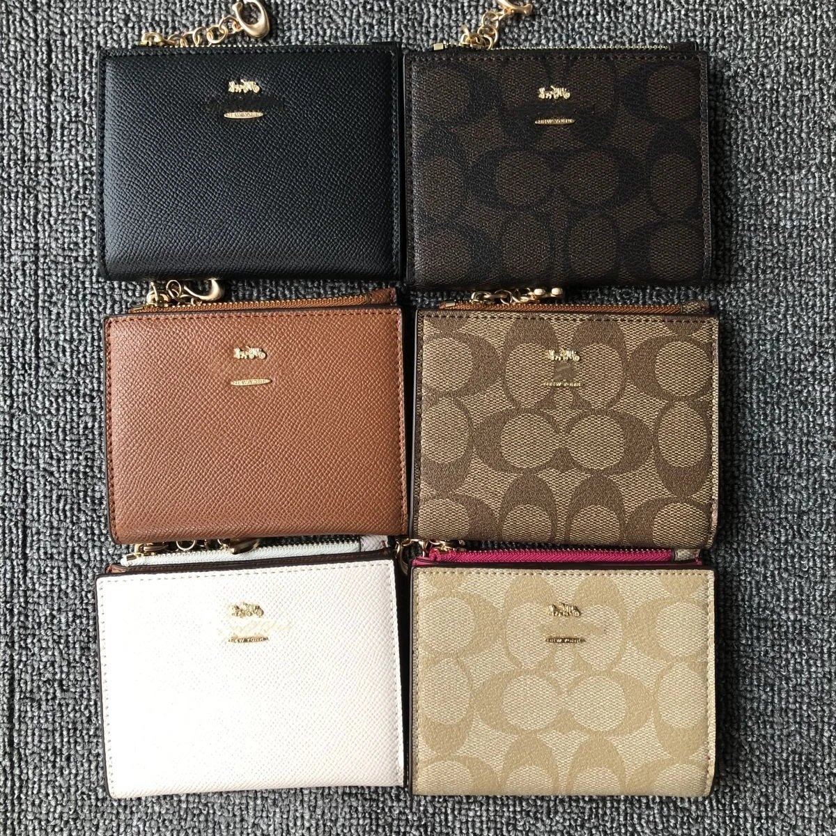 Coach Compact Wallets in Various Colors and Patterns