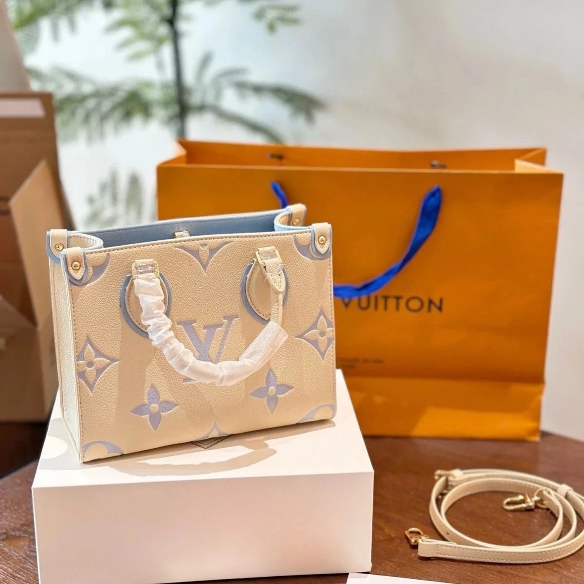 Louis Vuitton LV OnTheGo PM Monogram Empreinte Tote Bag Beige and Light Blue
